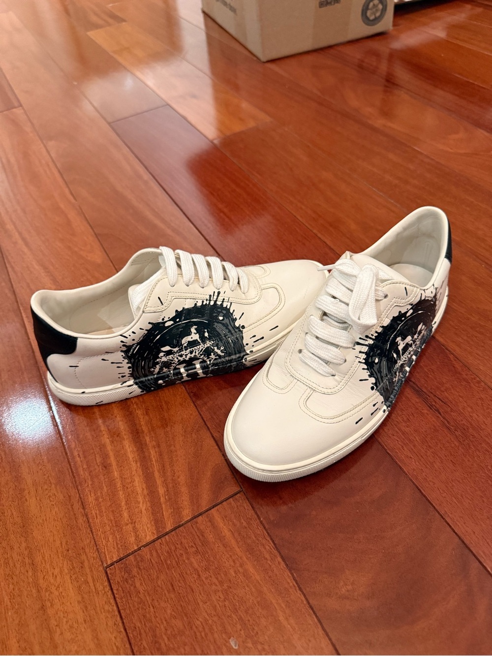 Hermes Leather Sneakers with Black Graphic Detail